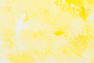 Yellow abstract watercolor painting textured on white paper background