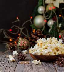 popcorn on the background of Christmas and New Year's decorations, selective focus