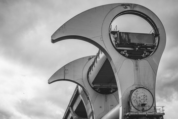 Close up detail of the Falkirk wheel in black and white on a cloudy gloomy day