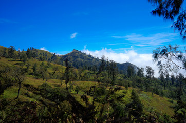 View over clouds from Mountain blue sky Mount Rinjani Lombok Ind