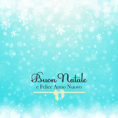 Christmas winter abstract background with snowflakes, bokeh lights and congratulations. Christmas New Year's wallpaper. Buon Natale e Felice Anno Nuovo