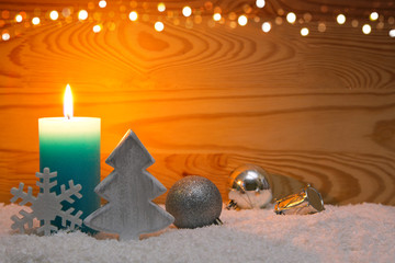 Christmas silver decoration and Advent candle. Christmas card.