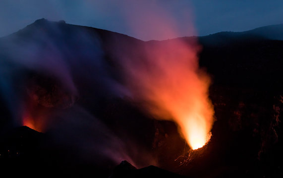 Close up of glowing fumaroles at the summit of Stromboli vulcano, Italy, at sunset.