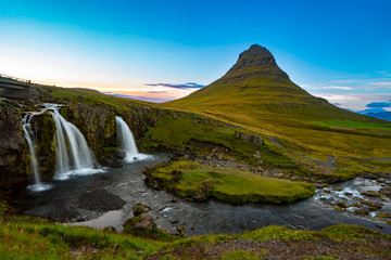 Sunset over the Kirkjufellsfoss Waterfall with Kirkjufell Mountain