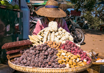 Street vendor selling sweet pastries in the  Old Bagan, Myanmar.