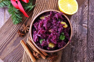 Red Cabbage salad with orange and pecan nuts for Christmas dinner. Vegetarian dish