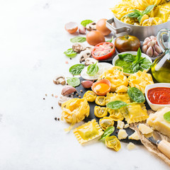 Italian food and ingredients, ravioli pasta tortellini pesto tomato sauce