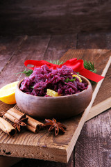 Red Cabbage salad with orange and pecan nuts for Christmas dinner. Vegetarian dish