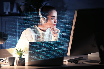 Young woman working with computer at table. Concept of cyber attack