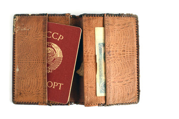 the passport of the USSR in the old purse on white background