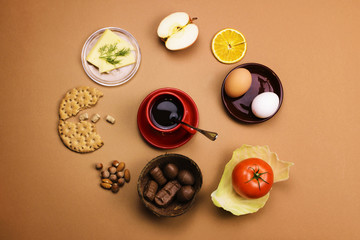 Fototapeta na wymiar Assorted healthy food on a colored background