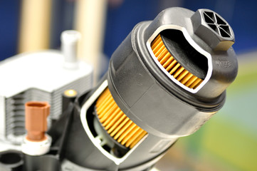 Car oil filter with housing.