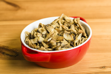 bowl with fried mushrooms
