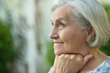 senior woman in summer park