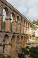 Obraz premium Ruins of the Roman aqueduct near Tarragona town, Spain