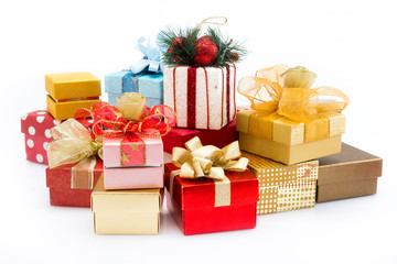 Pile of colorful gift boxes isolated on white background