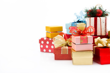 Pile of colorful gift boxes isolated on white background