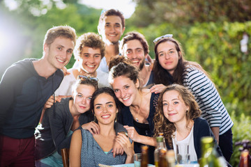 Group of  young people, they are looking at camera