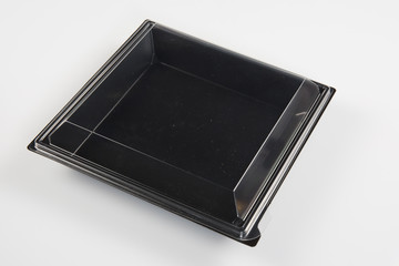 Plastic food container on white background. Top view.