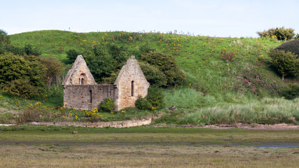 ALNMOUTH NORTHUMBERLAND/UK - AUGUST 14 : Ruins of Mortuary Chapel on the West Side of Church Hill in Alnmouth Northumberland on August 14, 2010