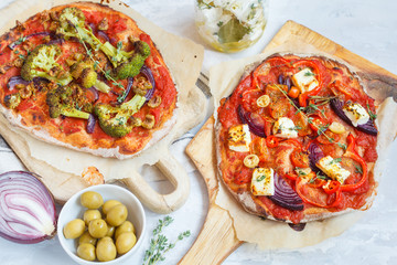 Homemade vegetarian vegetable pizza with feta cheese and broccoli.