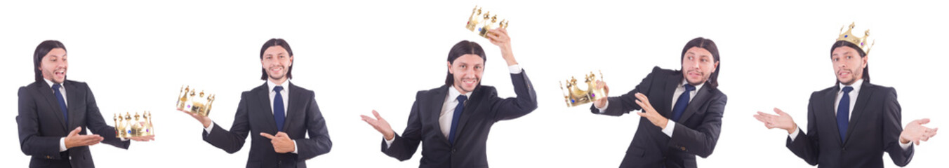 Businessman with crown isolated on white