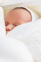 Sleeping newborn baby close up portrait