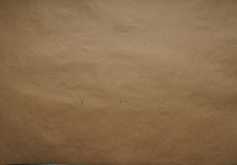 Kraft wrapping paper. Sheet. Brown color The texture. Top view, close-up 