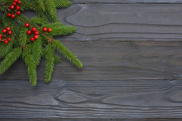 Christmas background. Top view with copy space. fir tree on dark wooden background