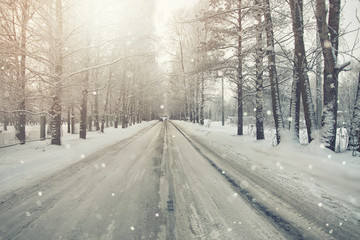 Fototapeta na wymiar road in the snowy storm winter