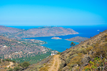 Panoramic view of the gulf of Mirambello with Spinalonga island. View from the mountain of Oxa with ruins of ancient water tanks, Crete, Greece.