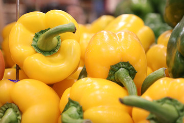 Yellow bell peppers at the market.