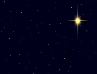 Fototapeta na wymiar Christmas star with golden glow in night sky