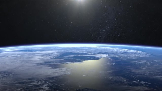 Earth. Flight over the Earth. 4K. Sunrise. The camera flies to the right.