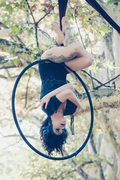  woman aerial hoop  dance in forest