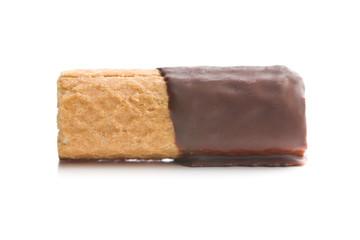 Sweet dessert. Biscuits rolls with chocolate icing.