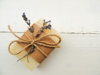 Handmade spa lavender soap on vintage wooden background. Soap making. Soap bars. Spa, skin care.	