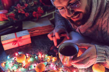 man with a blank book in his hands for the New Year's table with