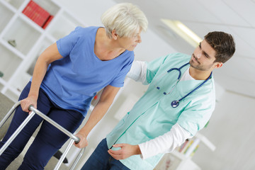 old woman on walking rehabilitation session