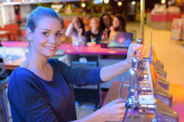 Lady working behind the bar