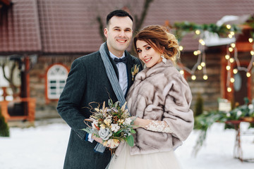 bride and groom at their winter wedding day. Winter Wedding.