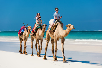 Mother and kids at tropical beach