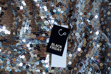 Black friday sale tag background shines sparkles