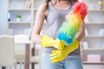 Woman doing cleaning at home