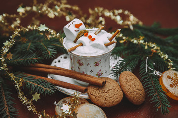 christmas marshmallow man in a cup of coffee
