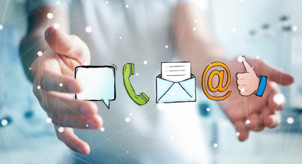 Businessman holding manuscript contact icon in his hand