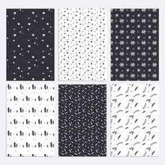 Set of flat design style patterns with the New Year, Christmas and winter motives. Vector illustrations for background, greeting cards, wrapping paper, web and graphic design.    