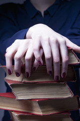 Light of knowledge. Young Student Girl with Books (Education and self development)