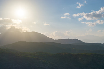 Obraz premium Amazing Beautiful color sunset scenic view of mountain landscapes with layer of mountains and fog