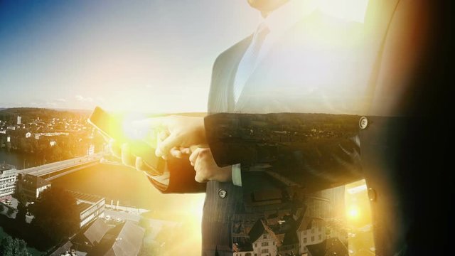 Solothurn Switzerland Cityscape Businessman digital tablet. Double exposure.